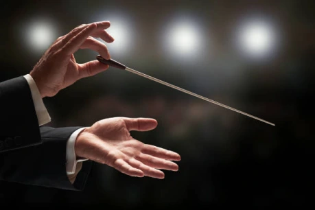 The Unseen Maestro conducting the orchestra